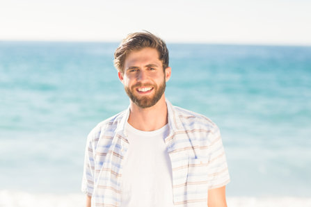 Smiling man on the beach